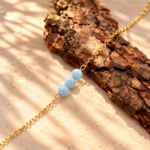 Accueil 42 Bracelet Chaine Dorée Anne en Aigue Marine - Amour