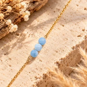 Accueil 44 Bracelet Chaine Dorée Anne en Aigue Marine - Amour